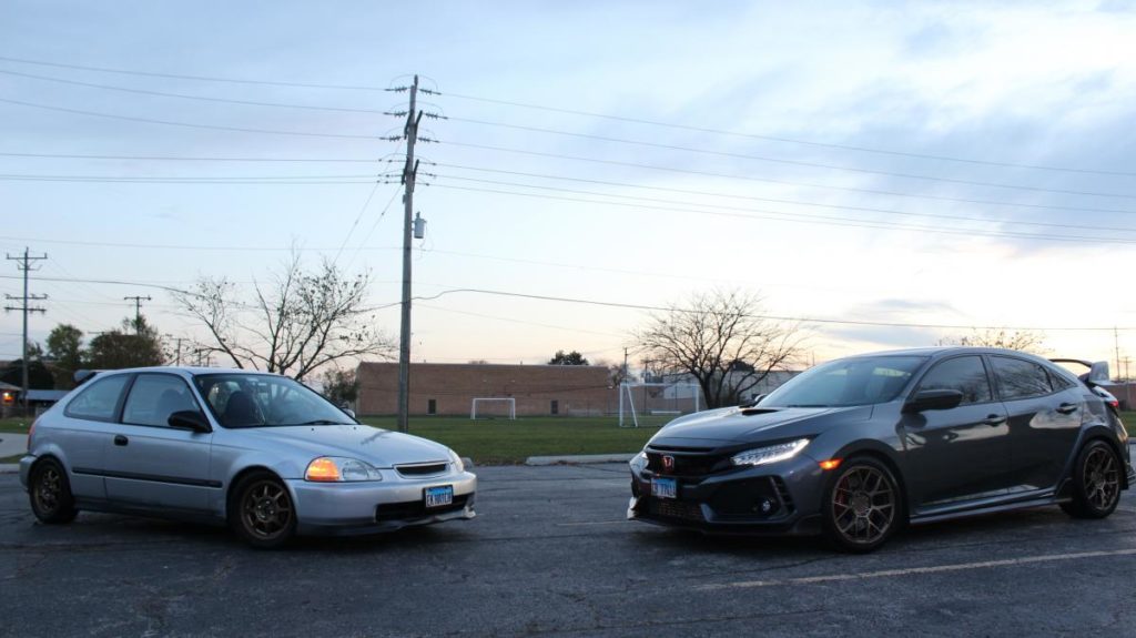 2 of the cars Virgilio Nunez has worked on parked in a parking lot